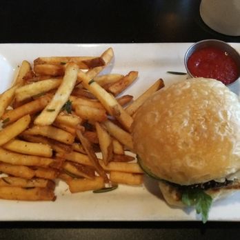 The Owl House signature dishes BVE Burger (choice of beef or chickpea patty), Cauli Wings, Tofu Dinner